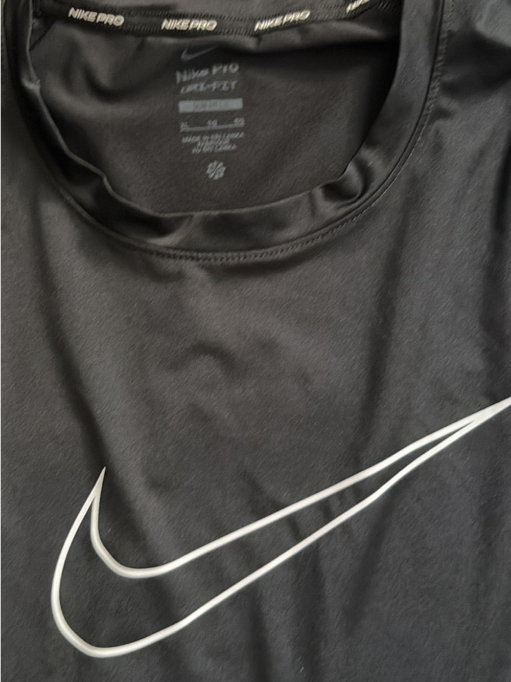 Nike White Performance Tee with Silver Swoosh